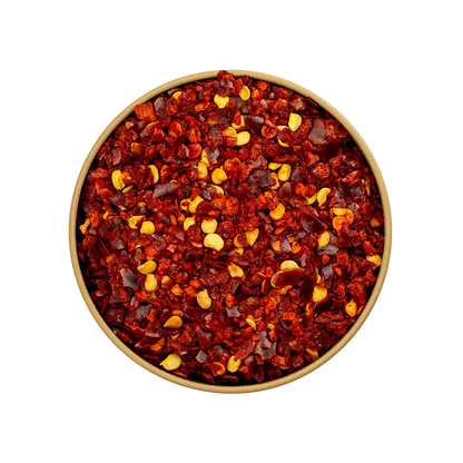 Bird Eye Chili Flocken – leuchtend rote, grob gemahlene Chilistücke mit sichtbaren Samen