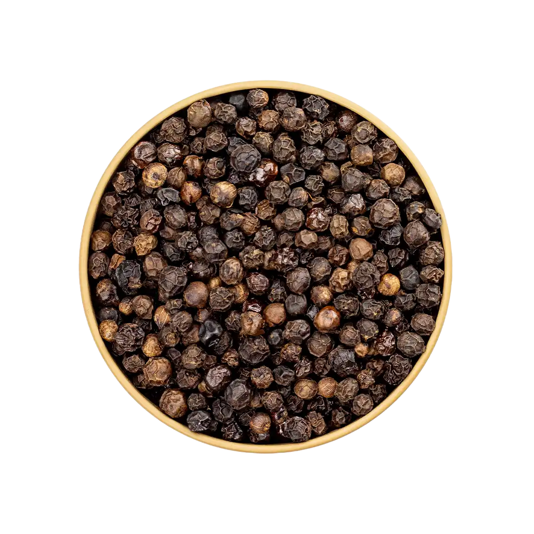 Rauchpfeffer – dunkel geräucherte Pfefferkörner in der Schale von oben fotografiert